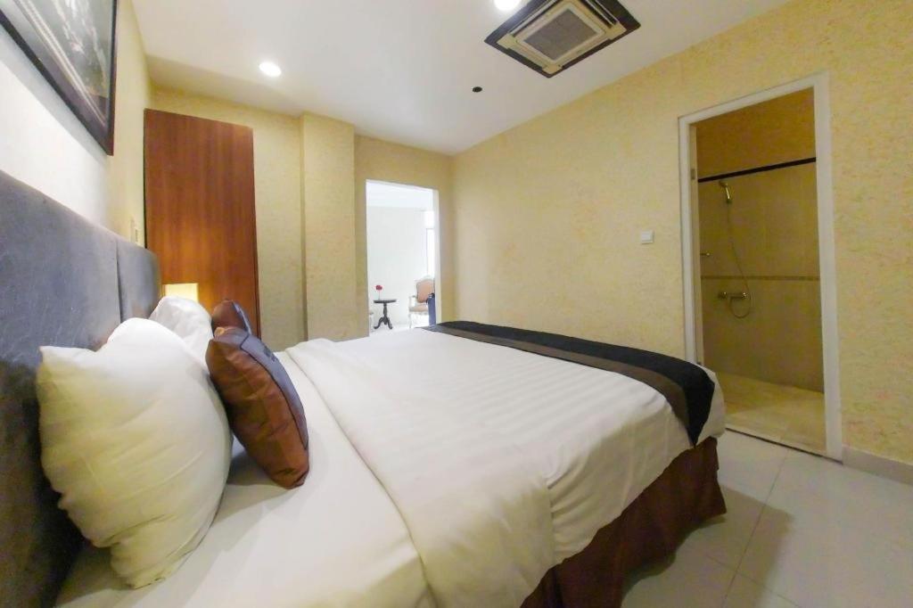 Amos Cozy Hotel Melawai Jakarta Bagian luar foto