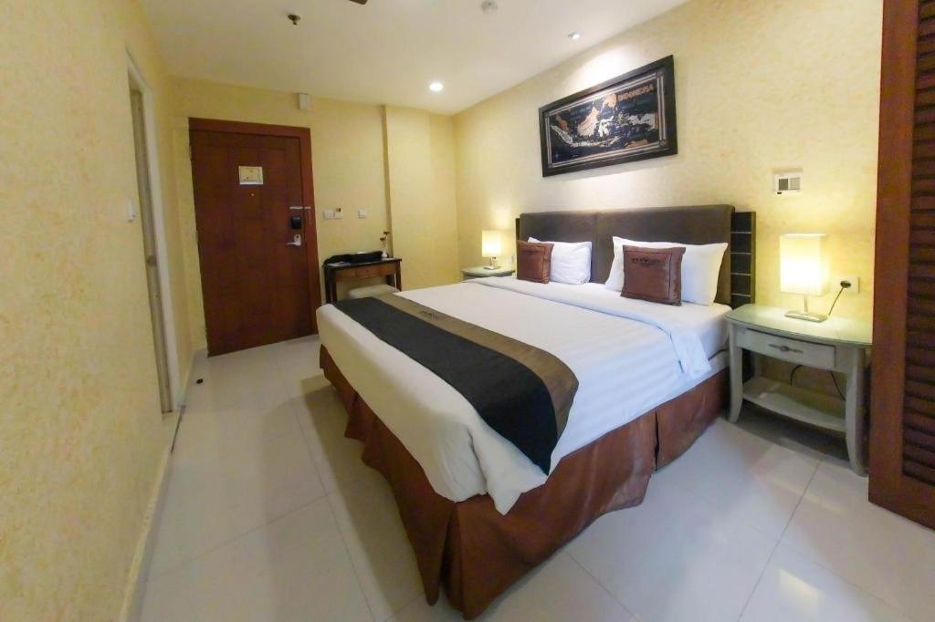 Amos Cozy Hotel Melawai Jakarta Bagian luar foto
